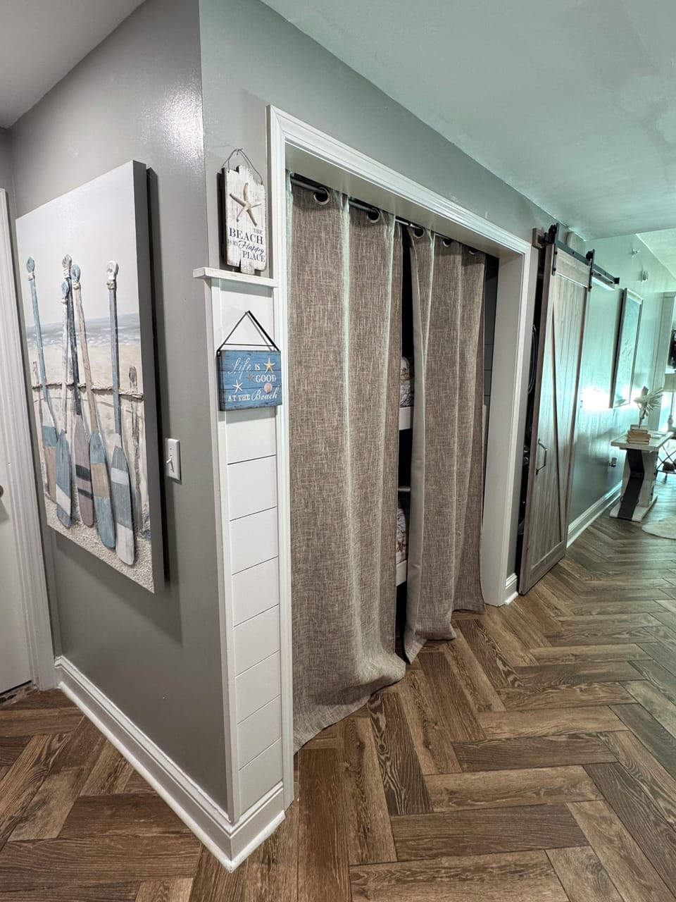 Bunk bed alcove area behind curtains 