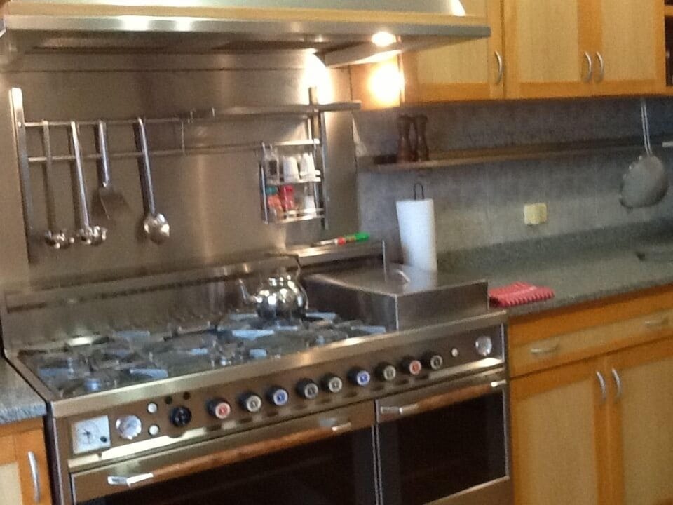 Gourmet kitchen (electric oven and microwave not shown)