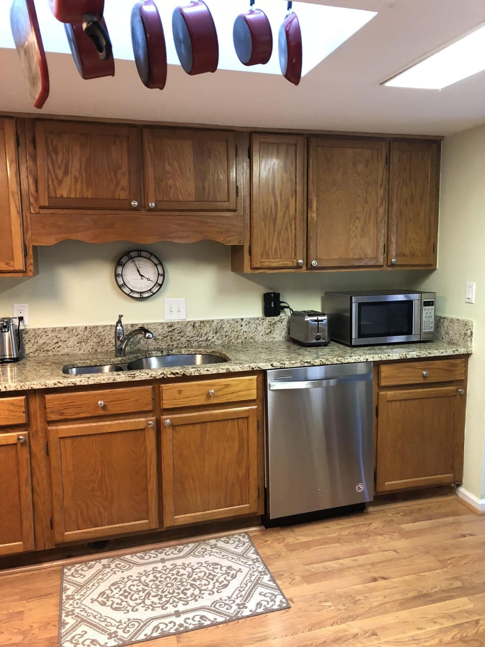 Well equipped kitchen with skylight.