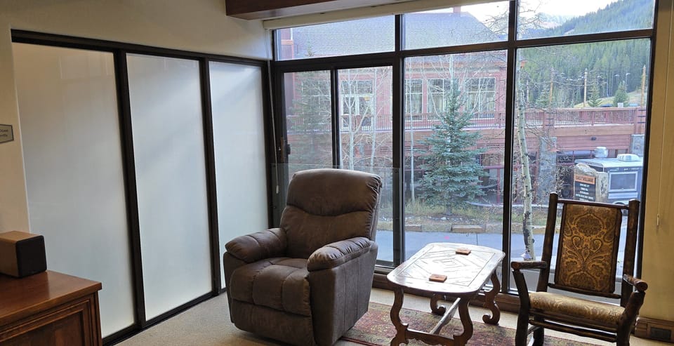 Close the sliding wall between the Living Room & Den for private sleeping areas