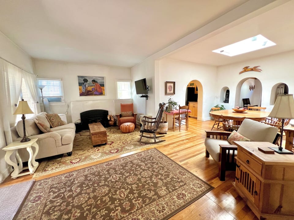 Open living & dining area with high ceilings