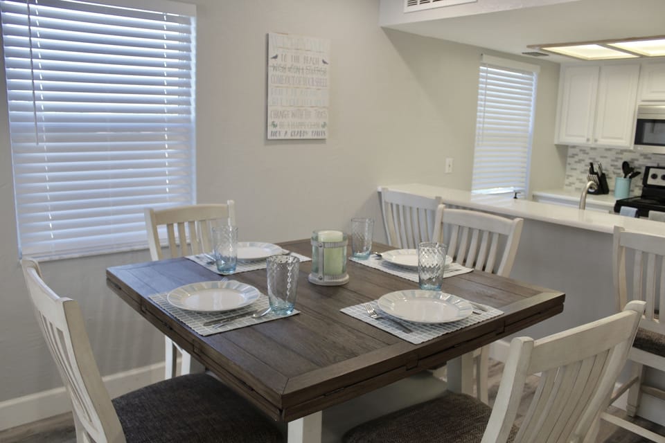 Table comfortably seats 4 and folds out to make room for 6