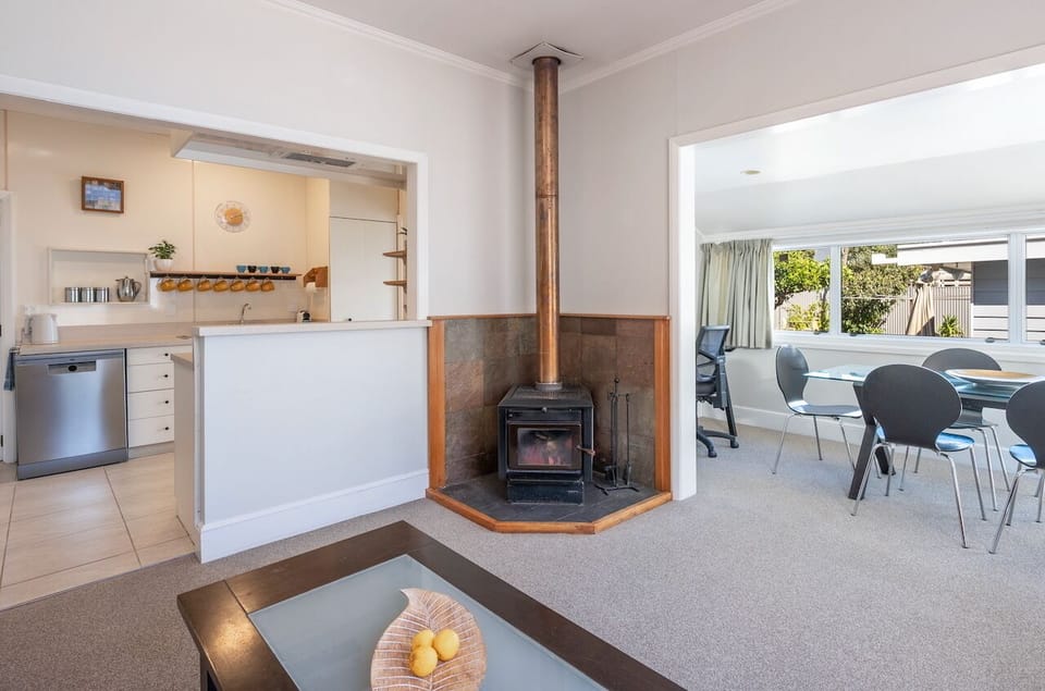 Open plan living/dining/kitchen with woodturner