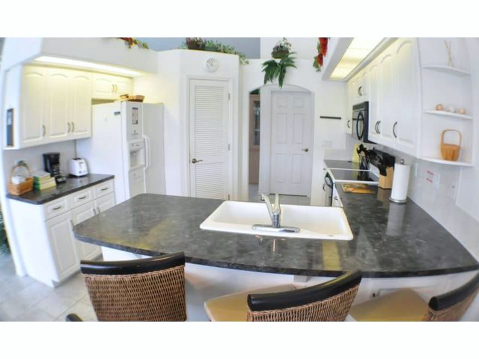Counter space for conversation while preparing meals