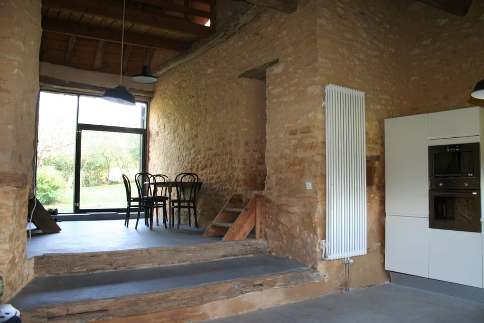view from Kitchen (now with big table!)