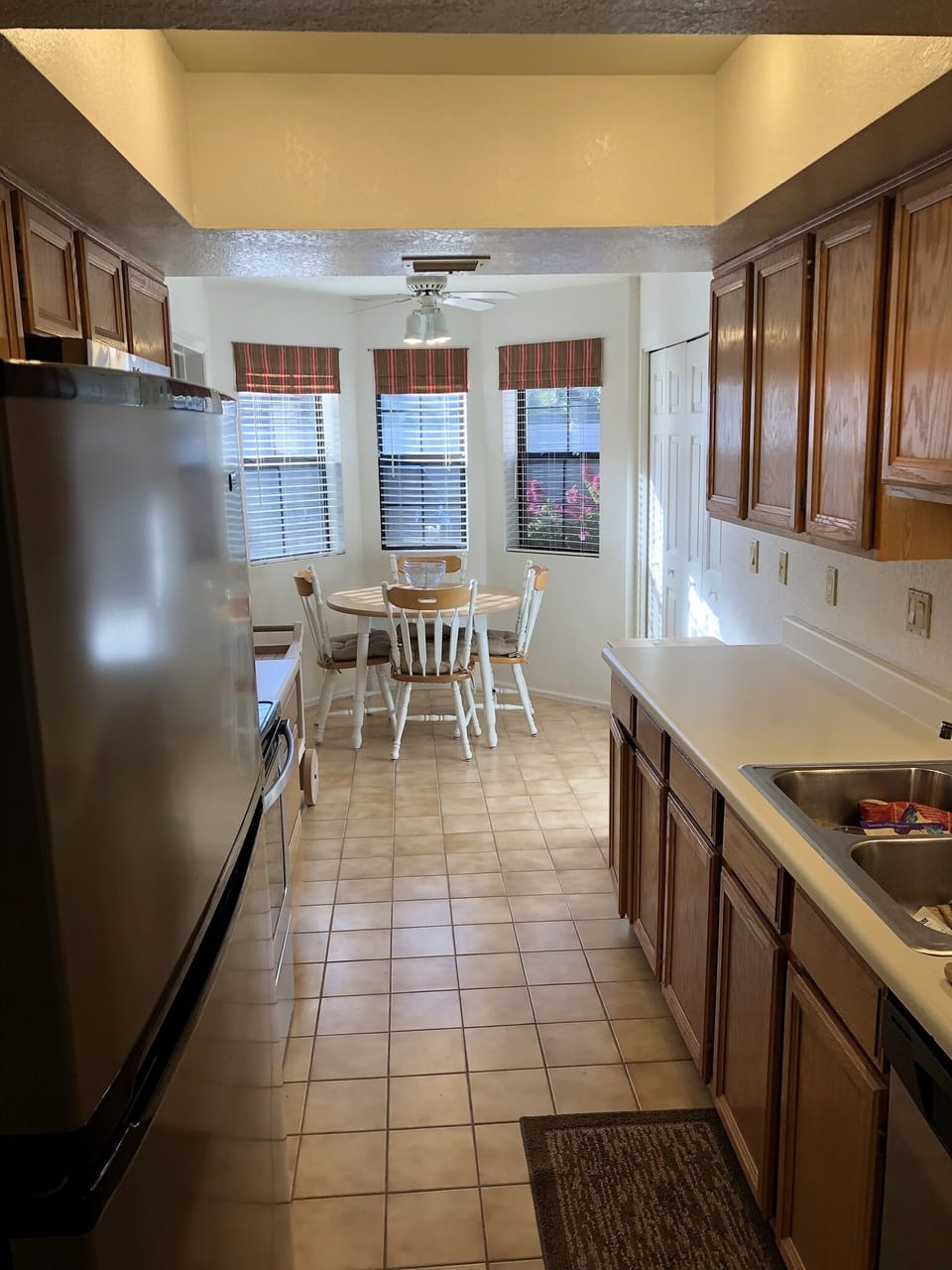 galley kitchen with seating area