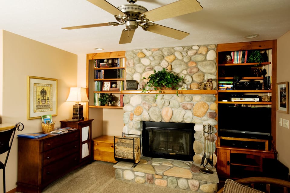 Wood burning fireplace in family room.