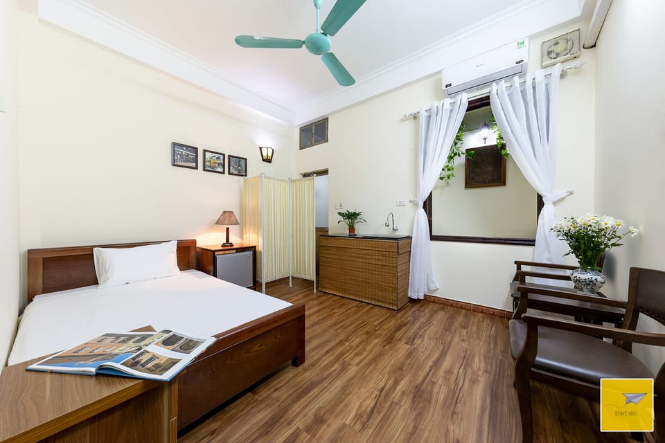 our 2nd room with single bed and a  kitchen counter