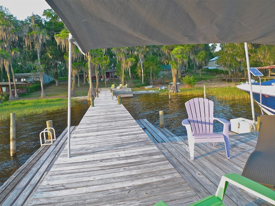 175' long dock and beach. Solar shade sail area at end of dock