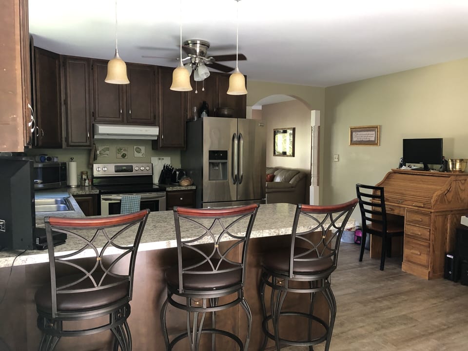 Kitchen, stainless steel appliances, dishwasher, disposal, coffee maker, tv