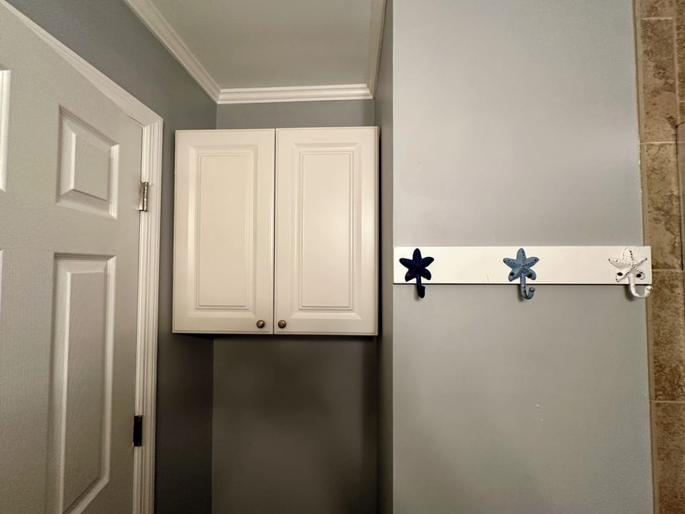 Extra storage cabinet in bathroom
