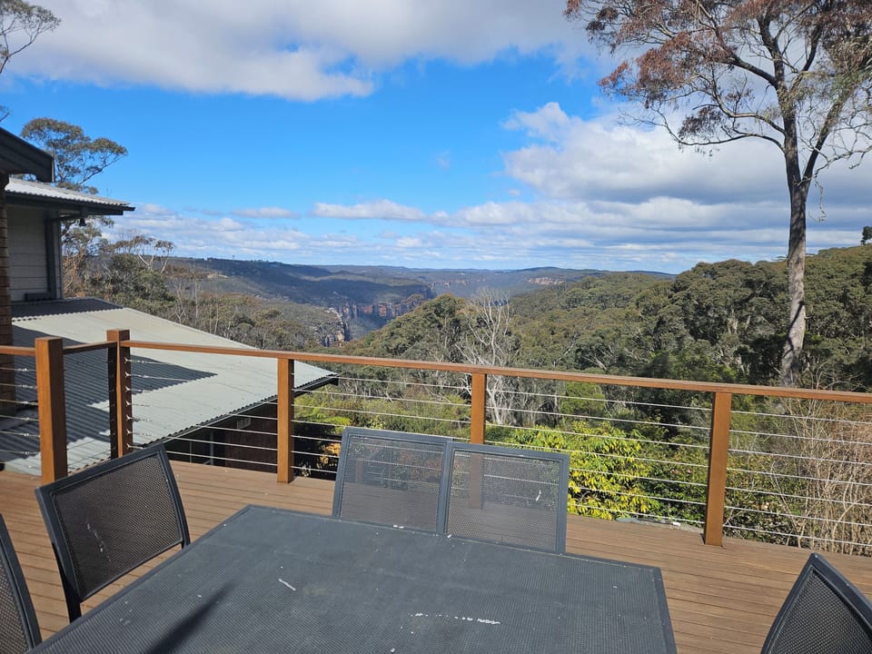 A huge sunny entertaining deck with a natural gas BBQ and view spanning 200KM's.