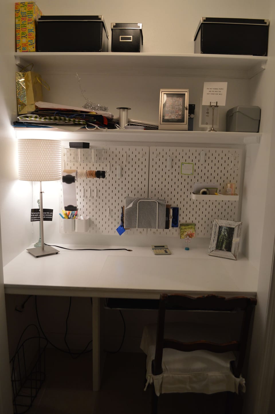 Desk, gift wrapping station in twin bedroom.