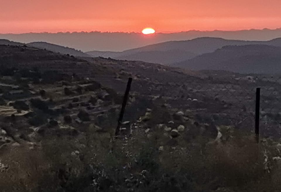Sun set view , back street of our property 