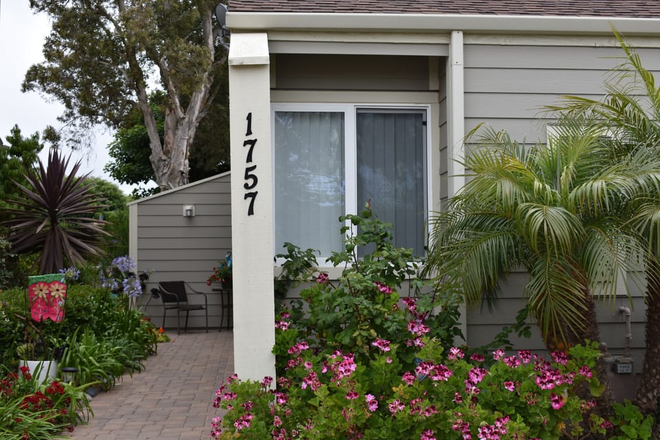 FLOWER LINED PATHWAY TO PORCH