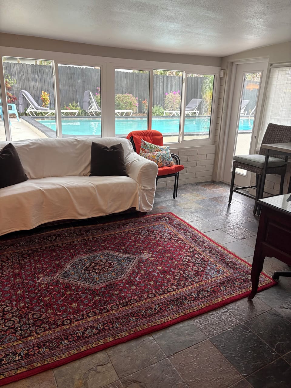 Patio room w pull out sofa off pool