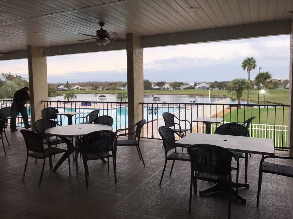outdoor cafe at Sports bar overlooking lake,golf course, Olympic pool
