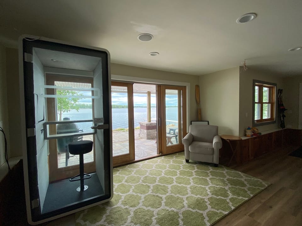 Basement includes pull out couch, laundry, office pod and living area.
