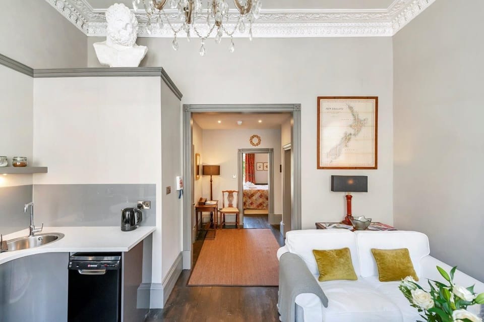 Lounge leading to the hallway and bedroom