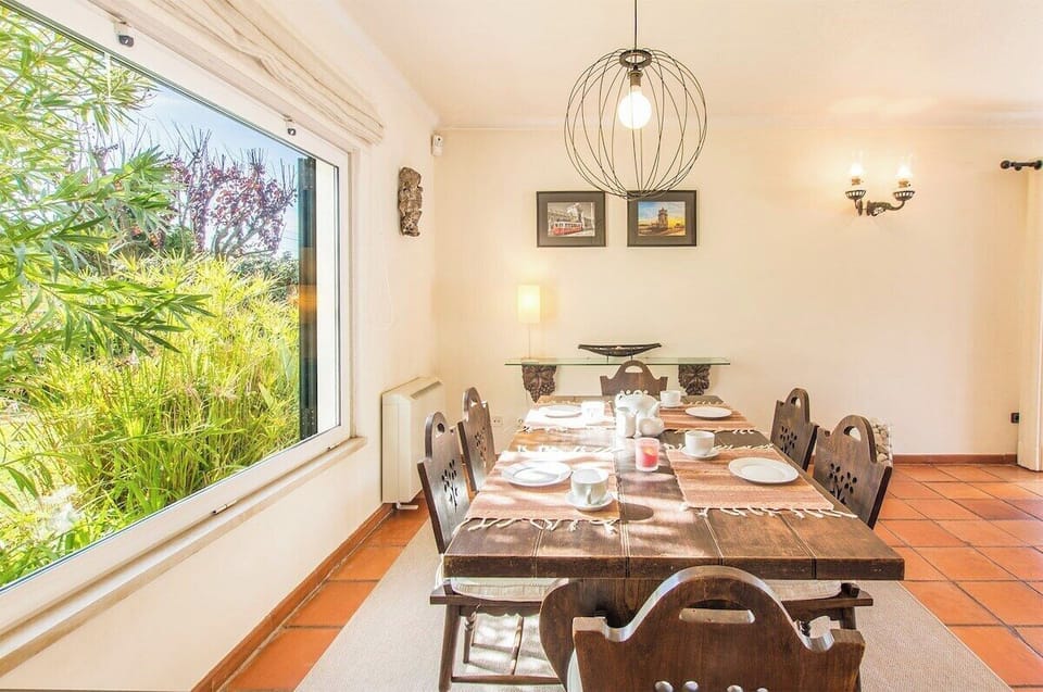 Rustic dining room with plenty of natural light.