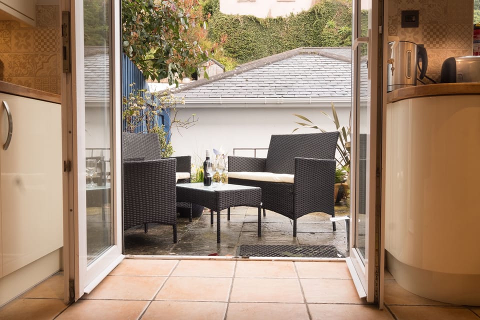 The garden is perfect for enjoying a drink at the end of a day on the beach.