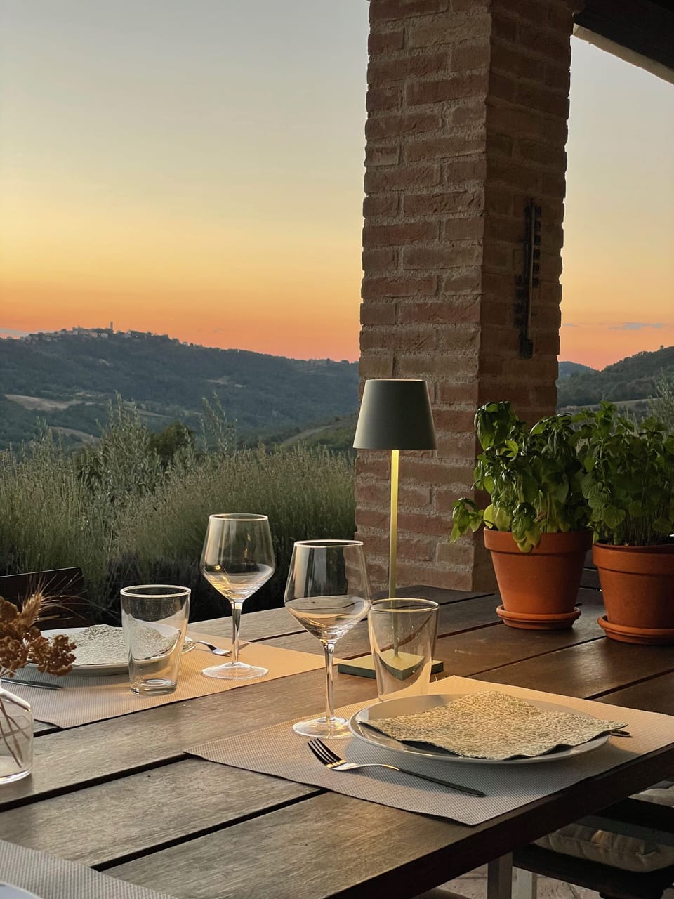 Enjoy a nice meal and drink on the deck with breathtaking views of the valleys