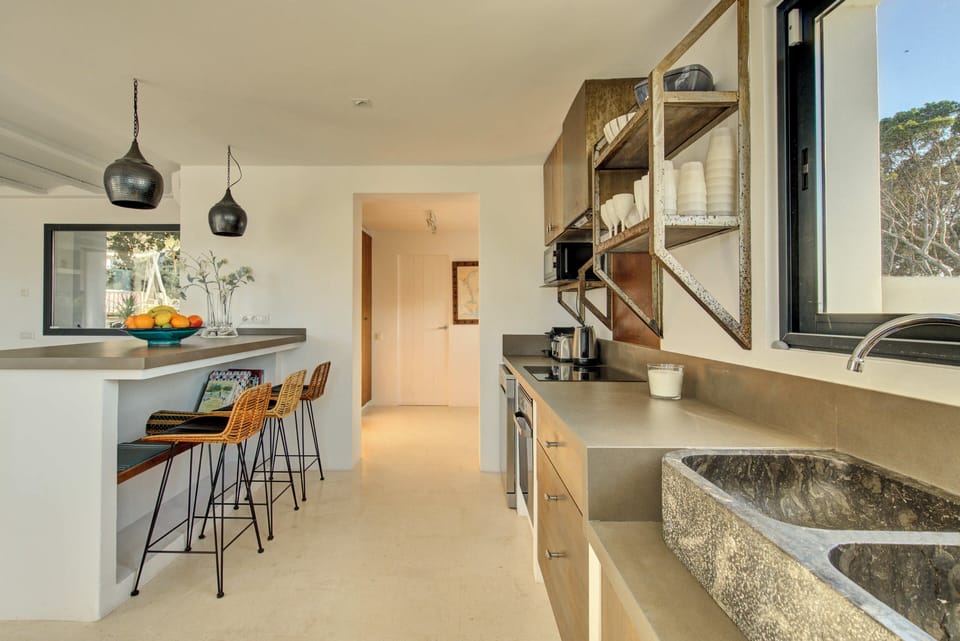 Kitchen , with pantry, study and laundry through archway