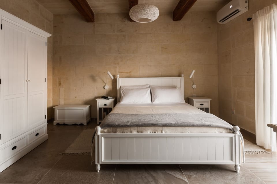 Bedroom with large terrace over looking swimming pool