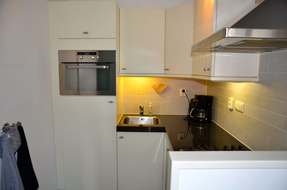 Kitchen with dishwasher and microwave