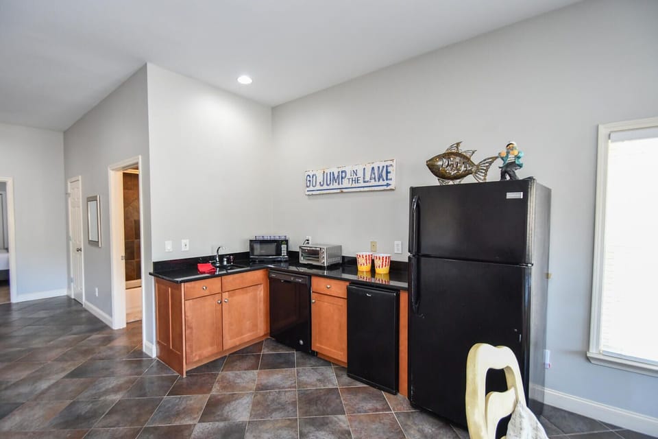 Terrace level living, dining and kitchenette 