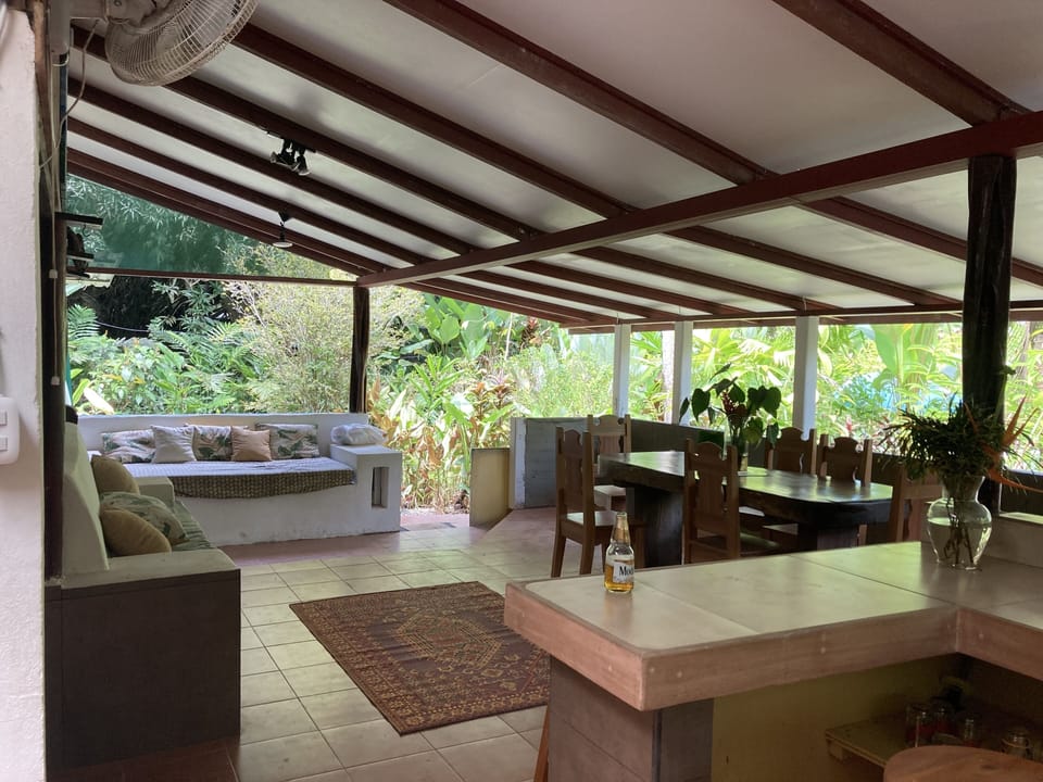 Looking from the kitchen into sala and dining area.