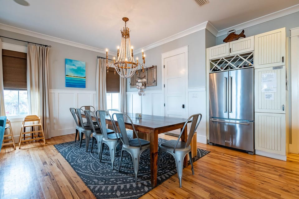 Seating for 10 at table and adjacent island has seating for 6. 