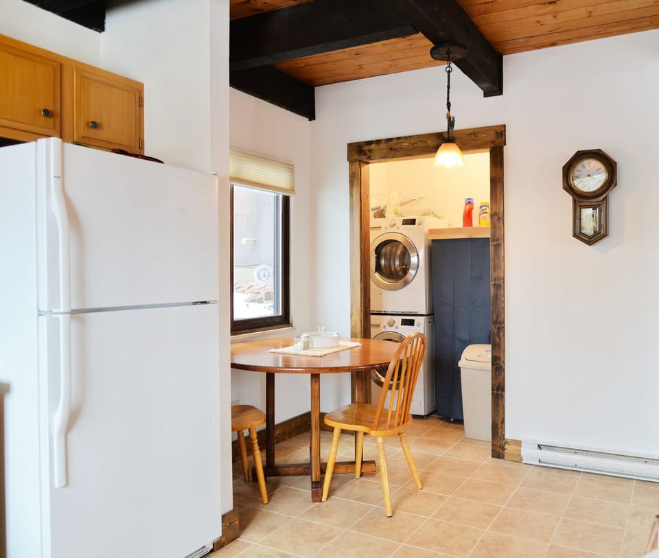 Breakfast nook and laundry unit. 