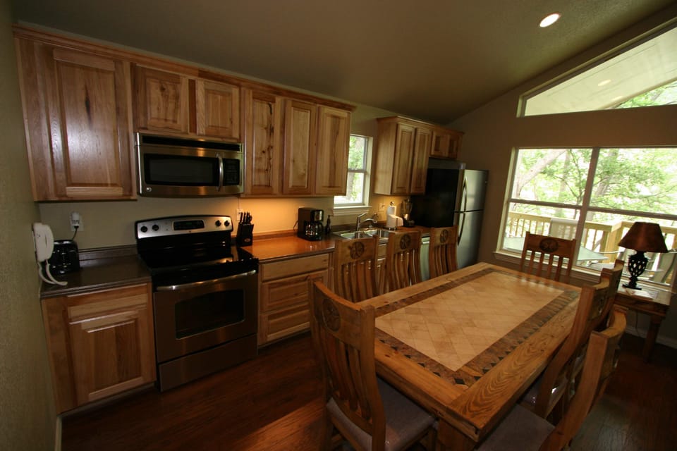 Large dining table seats 8. There is a porch table for 6 more.