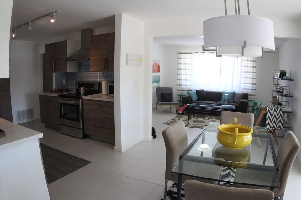 Kitchen, dining, living room combo works well for families...