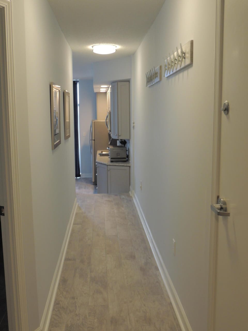 Beautiful tile floors throughout and plenty of hooks for swimsuits and towels!