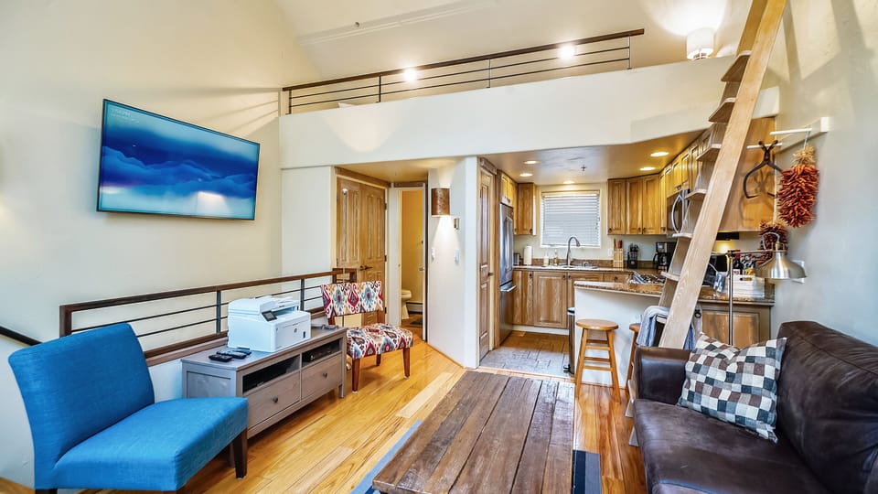 Living Room with Powder Room and Kitchen on Top Level