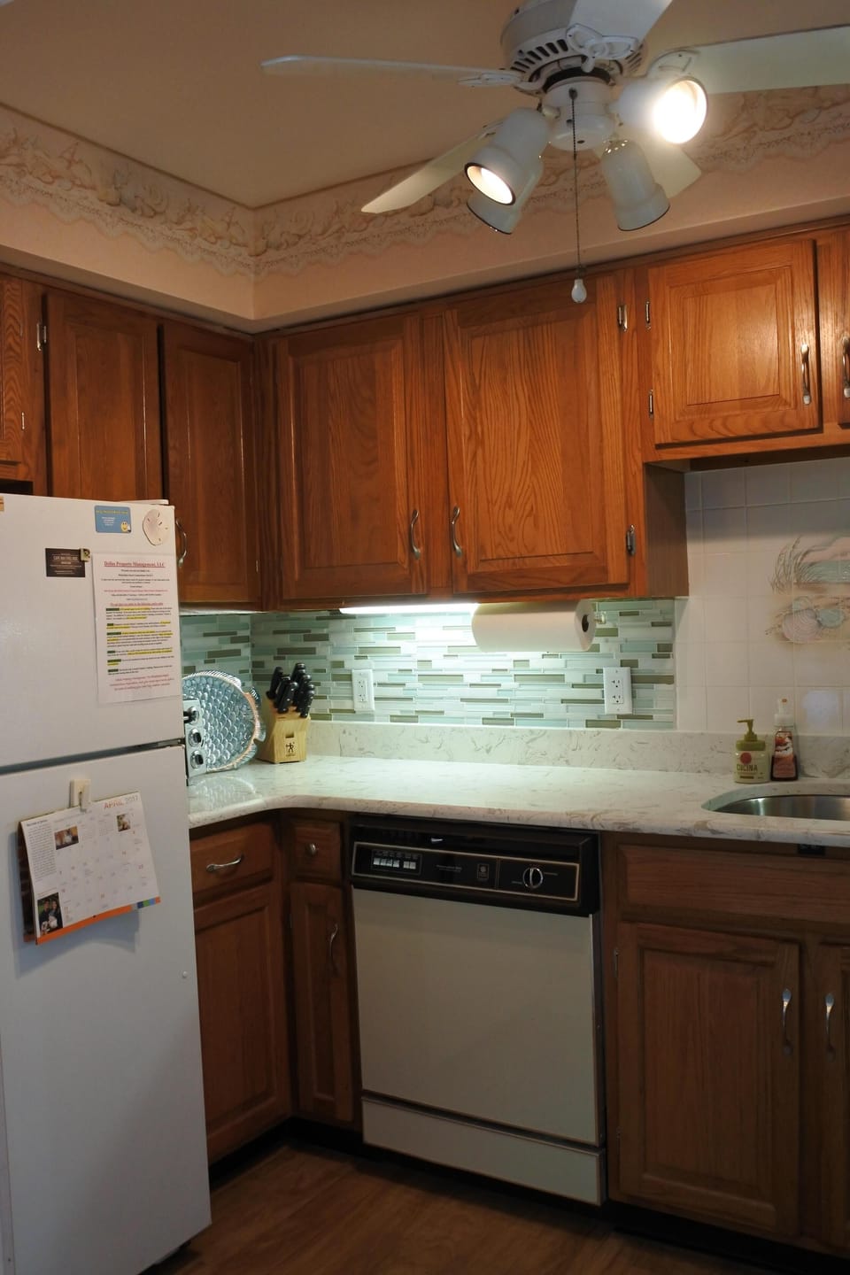 New quartz countertop and mosaic glass tile backsplash Spring 2017