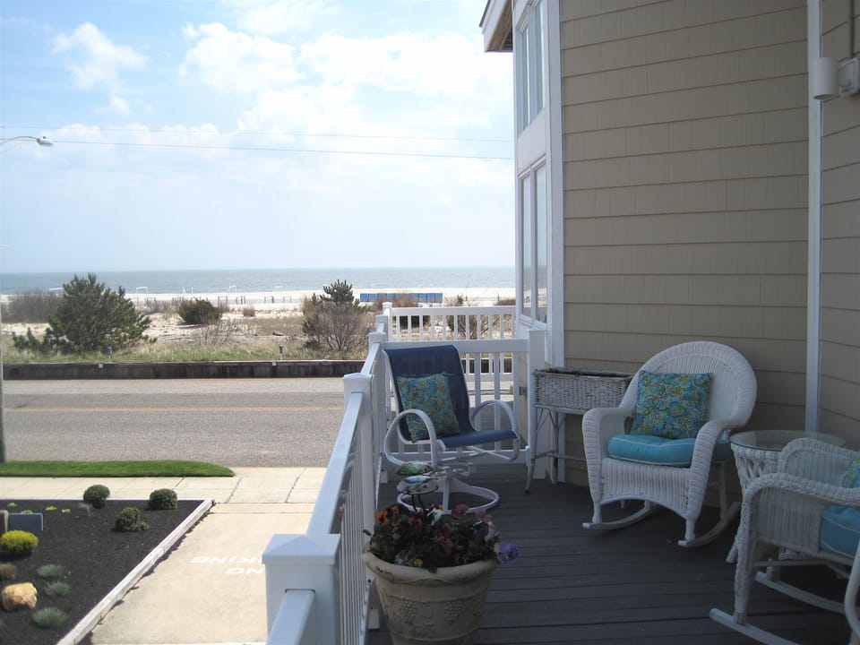 Lounge chair and multiple seating for guests. Beautiful beachfront views!