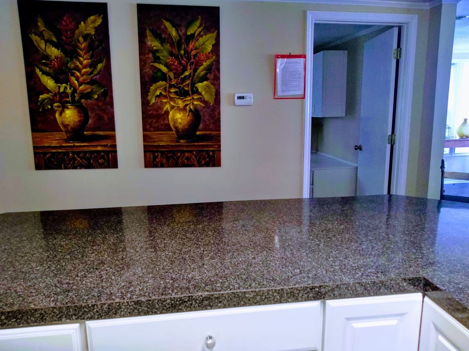 Door to smaller bedroom