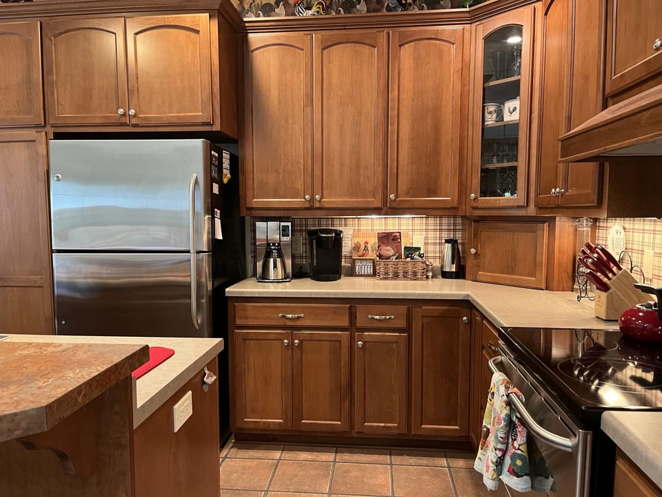 2 coffee makers shown in kitchen