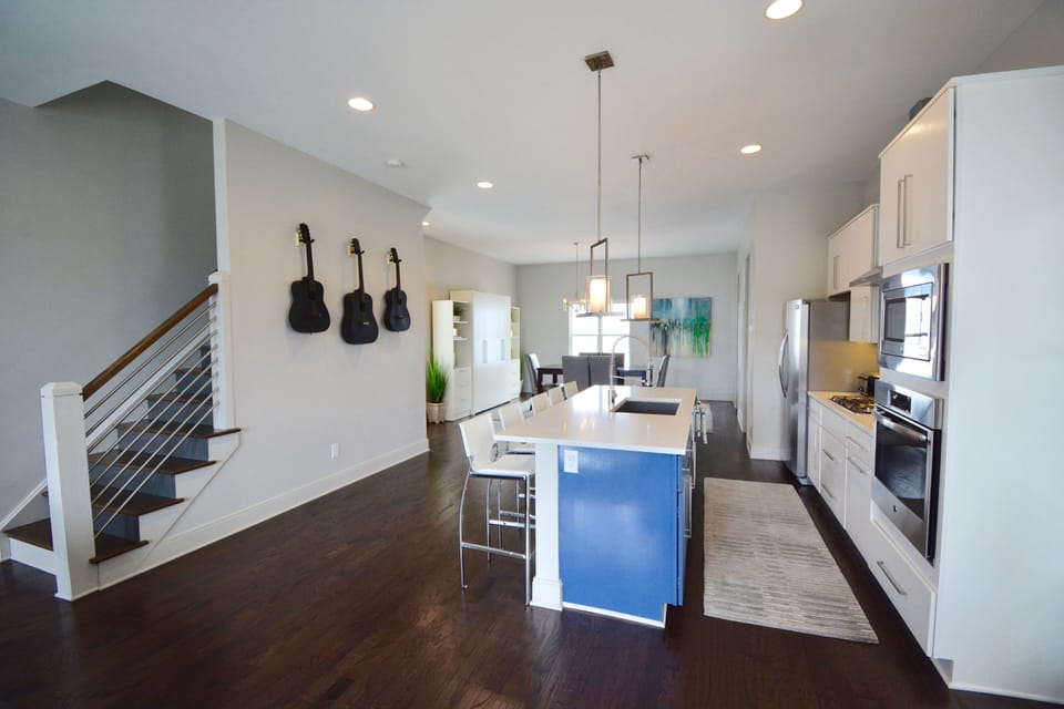 Grab a guitar off the wall and play while enjoying the open kitchen area