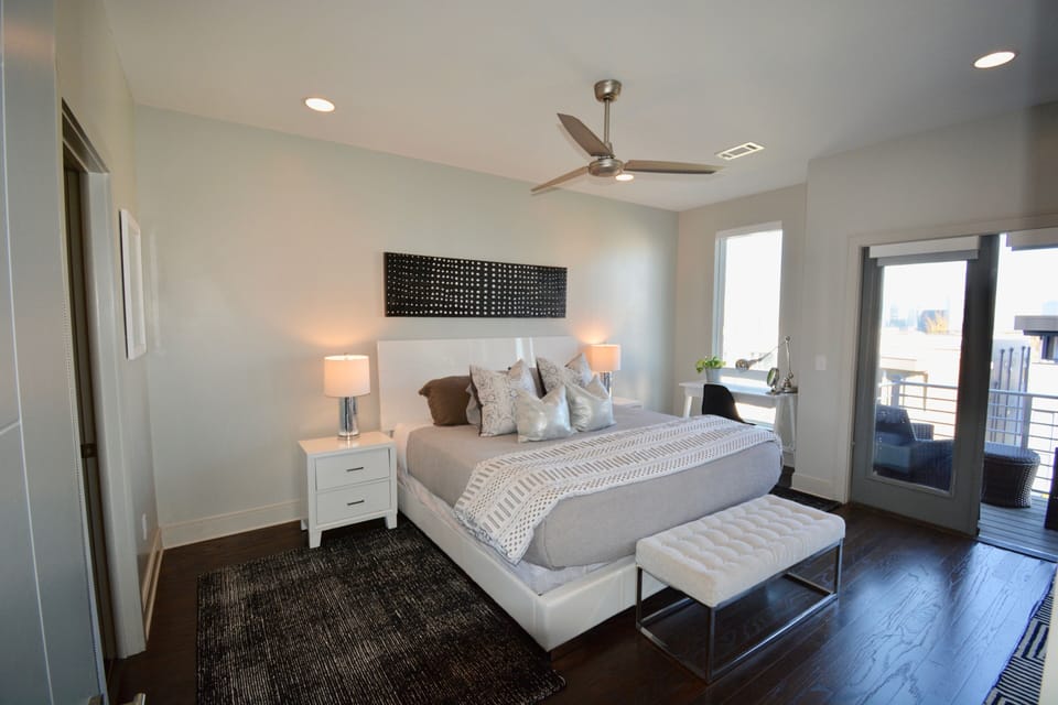 King bed, 55" TV and bathroom suite.