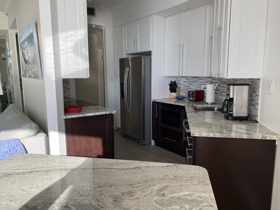 Sparkling clean kitchen with K-cup and regular drip coffee maker