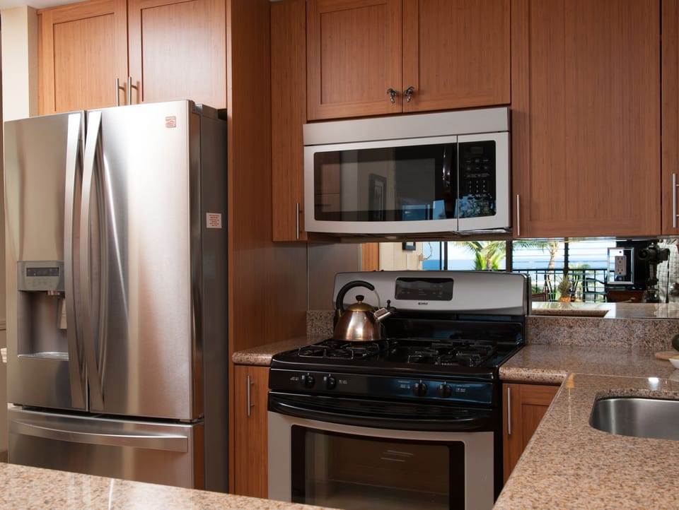New appliances. Mirrored backsplash