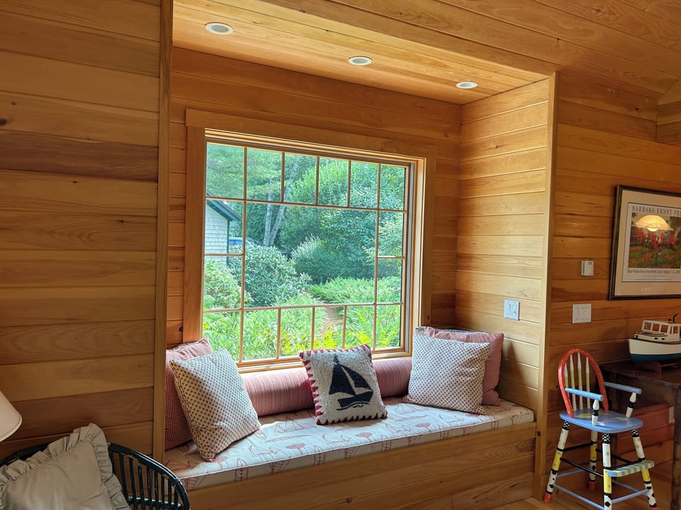 Cozy window seat, perfect for reading (or napping!).