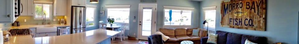 Panorama of great room and comfortable seating