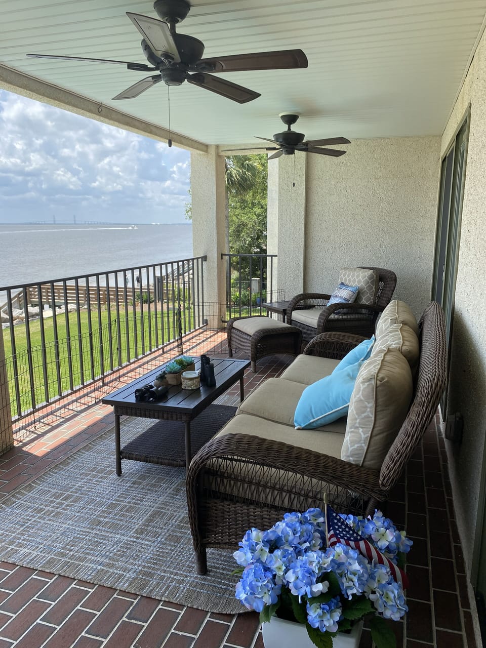 Balcony at #203.  1 full sofa, 2 lounge chairs.  