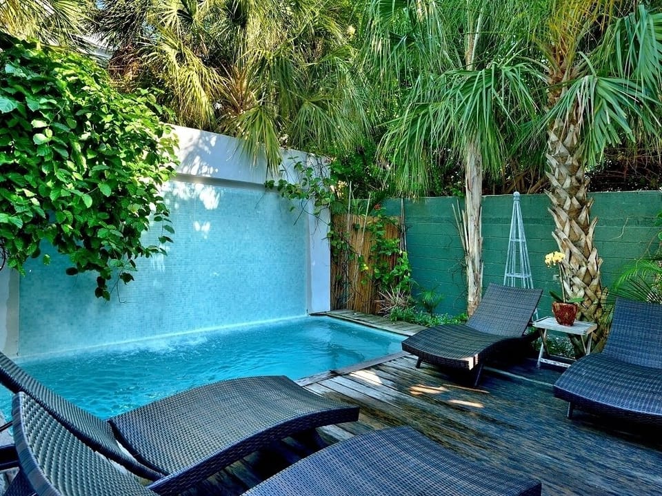 Penthouse - 
Heated pool and waterfall. 
1 of 2 pools/hot tubs on the property.