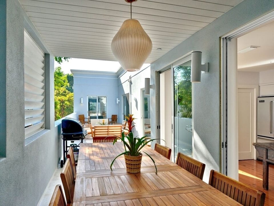 Penthouse - 
Covered teak outdoor dining table